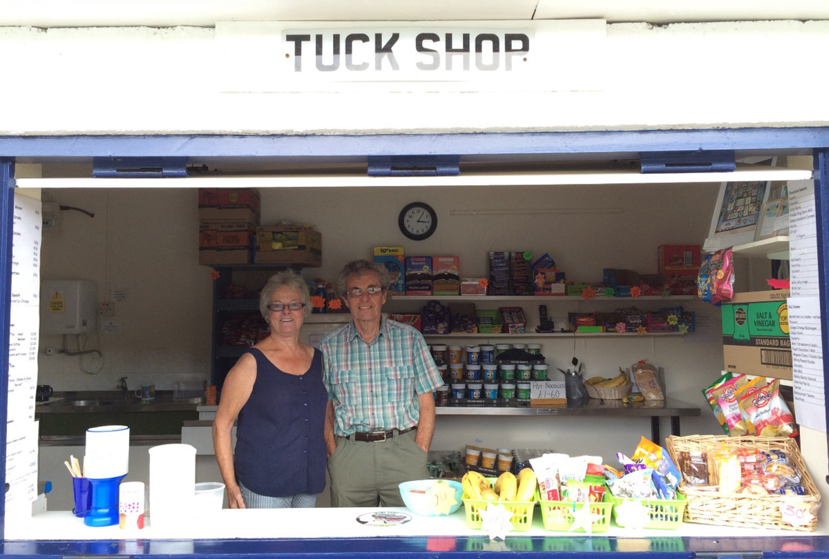 Members stood inside the tuck shop