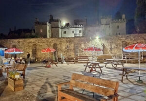 Outdoor bench area at night