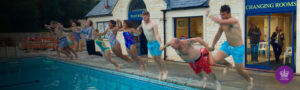 People jumping into pool