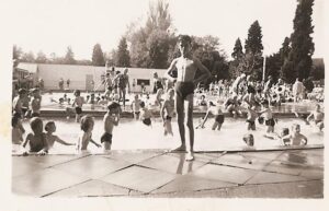 Historical picture of people enjoying pool